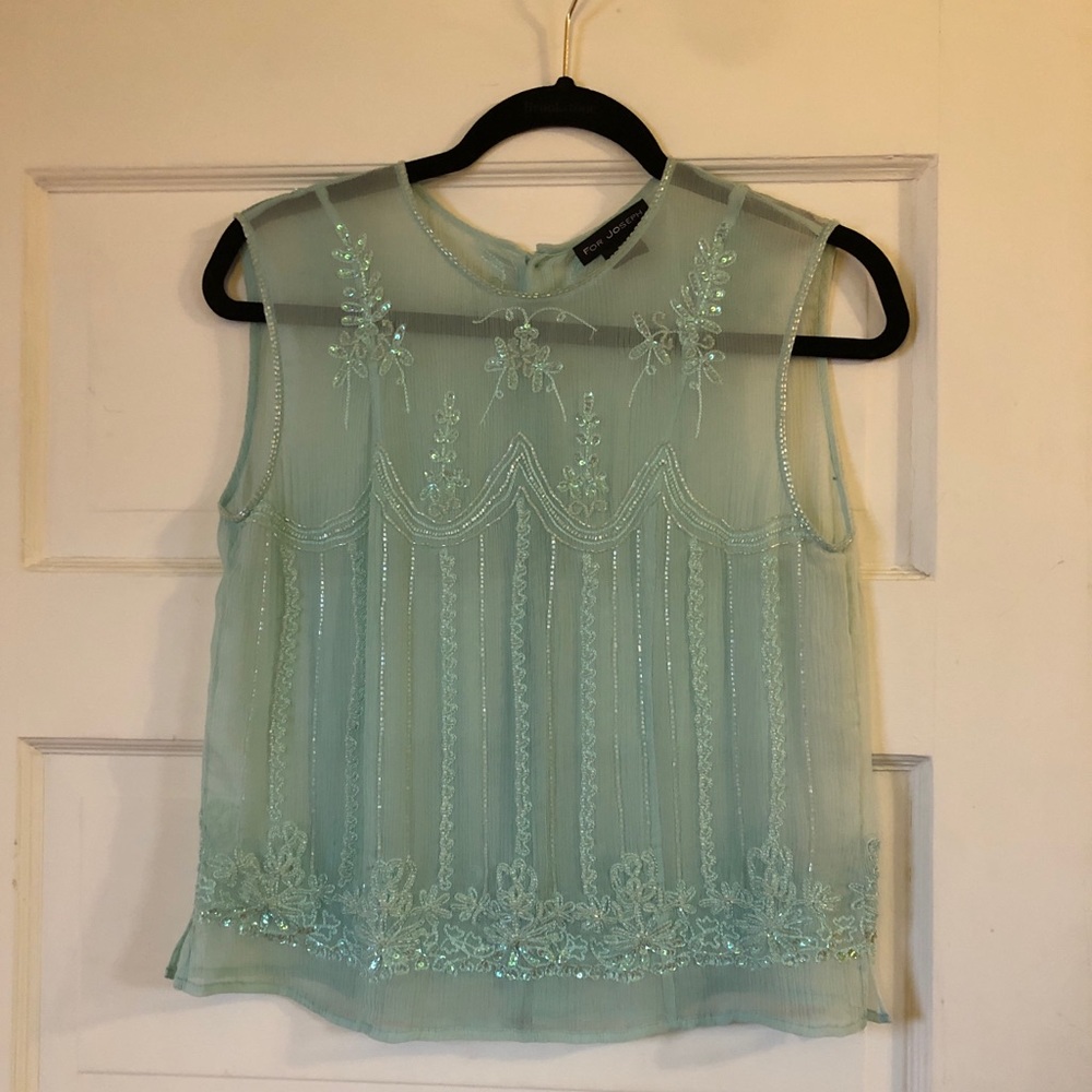 Beautiful sea foam green beaded top.